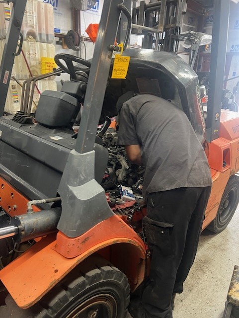 forklift being worked on by our forklift repair technician in milwaukee