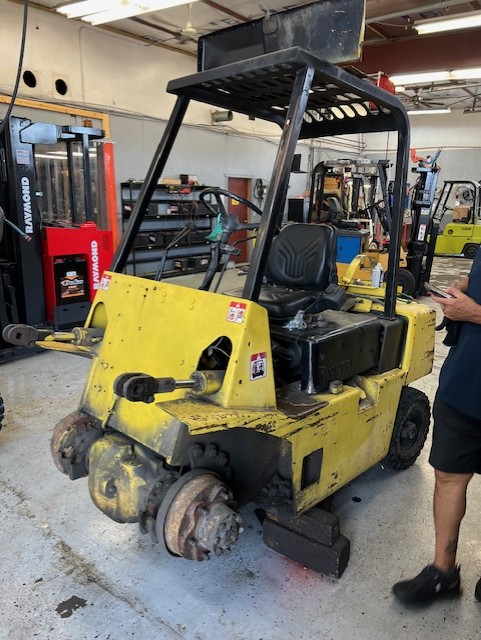 repairing a forklift in our waukesha forklift repair shop